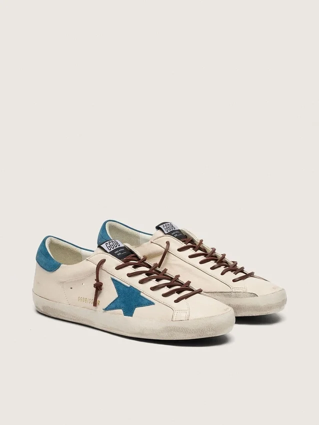 Super-Star para hombre en piel blanca con estrella de ante turquesa