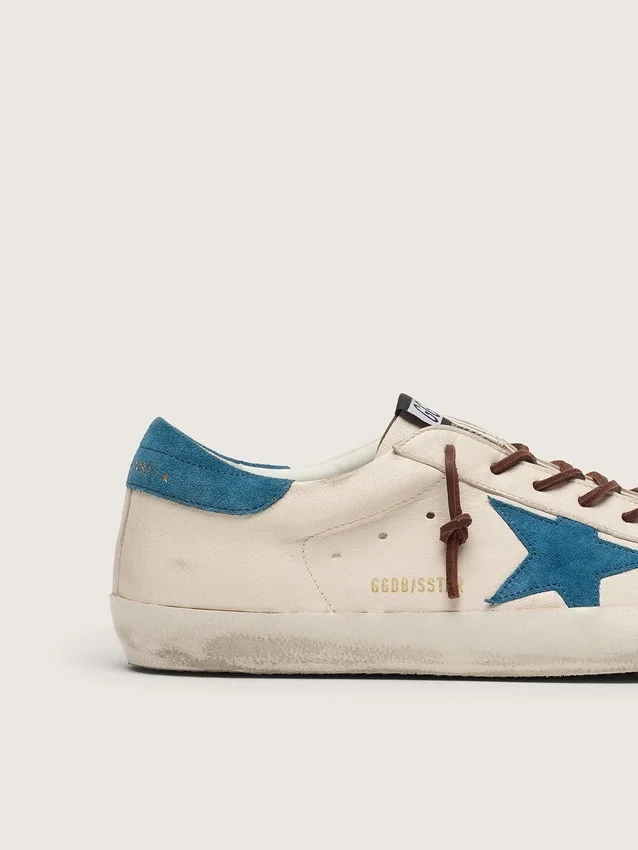 Super-Star para hombre en piel blanca con estrella de ante turquesa