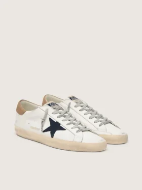 Super-Star para hombre en piel blanca con estrella de lona azul medianoche y lengüeta del talón en piel color tabaco