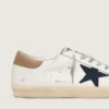 Super-Star para hombre en piel blanca con estrella de lona azul medianoche y lengüeta del talón en piel color tabaco