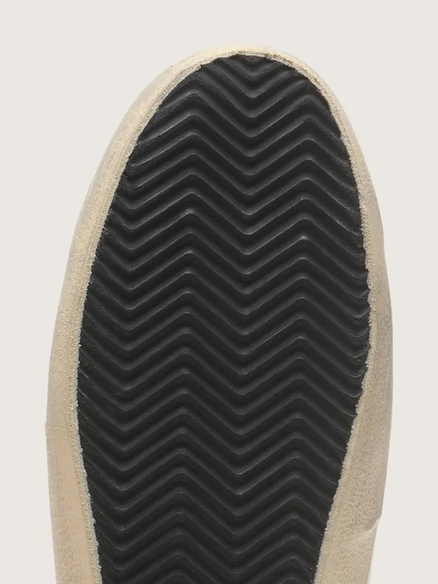 Super-Star para hombre en piel blanca con estrella de nubuck negro y lengüeta del talón de piel metalizada plateada