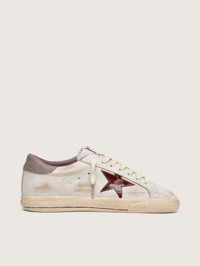 Super-Star para hombre en piel blanca con estrella de piel laminada en color burdeos