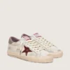 Super-Star para hombre en piel blanca con estrella de piel laminada en color burdeos