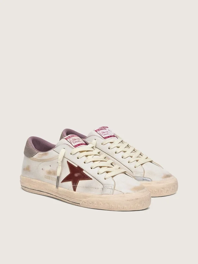 Super-Star para hombre en piel blanca con estrella de piel laminada en color burdeos