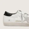 Super-Star para mujer con estrella de ante blanco y lengüeta en el talón de piel con estampado de cocodrilo negro