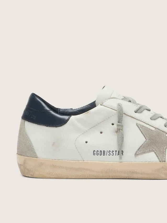 Super-Star para mujer con estrella de ante y lengüeta azul en el talón