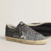 Super-Star para mujer con parte superior con purpurina y estrella de piel metalizada plateada