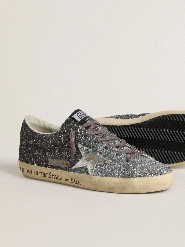 Super-Star para mujer con parte superior con purpurina y estrella de piel metalizada plateada