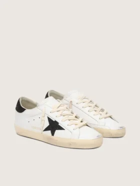 Super-Star para mujer con una estrella de cristales Swarovski negros y lengüeta en el talón
