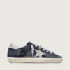 Super-Star para mujer en ante azul con estrella plateada brillante y lengüeta de cuero en el talón