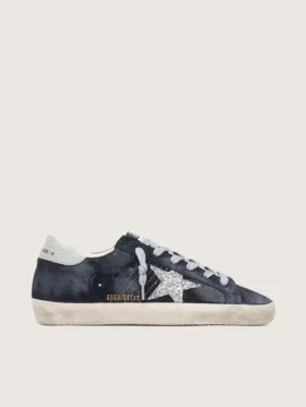 Super-Star para mujer en ante azul con estrella plateada brillante y lengüeta de cuero en el talón