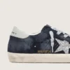 Super-Star para mujer en ante azul con estrella plateada brillante y lengüeta de cuero en el talón