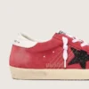 Super-Star para mujer en ante rojo con estrella brillante y lengüeta blanca en el talón