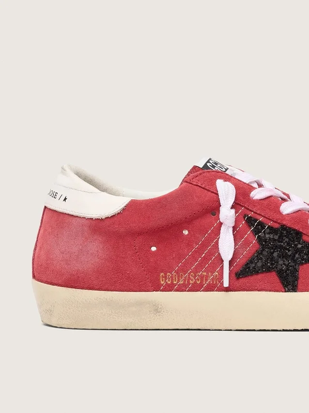 Super-Star para mujer en ante rojo con estrella brillante y lengüeta blanca en el talón