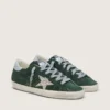Super-Star para mujer en ante verde, con estrella plateada brillante y lengüeta de cuero en el talón