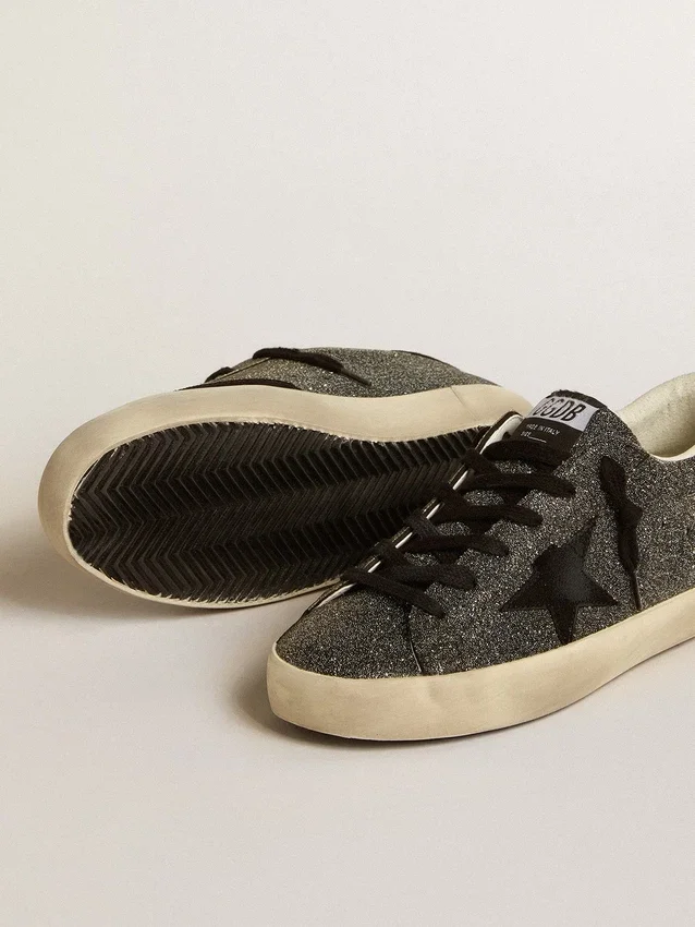 Super-Star para mujer en cristales Swarovski negros con estrella de ante negro