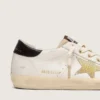 Super-Star para mujer en piel blanca con estrella dorada de Swarovski