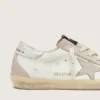 Super-Star para mujer en piel blanca y rosa empolvado con estrella de cristal Swarovski plateada