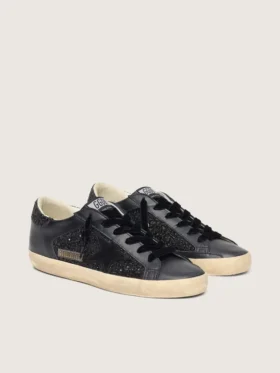 Super-Star para mujer en purpurina negra con estrella de ante negro e inserciones de piel