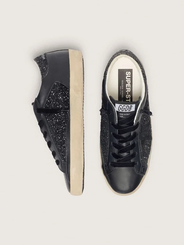 Super-Star para mujer en purpurina negra con estrella de ante negro e inserciones de piel