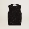 Top de punto de malla negro con lentejuelas y detalles en contraste