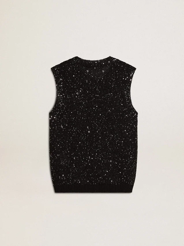 Top de punto de malla negro con lentejuelas y detalles en contraste