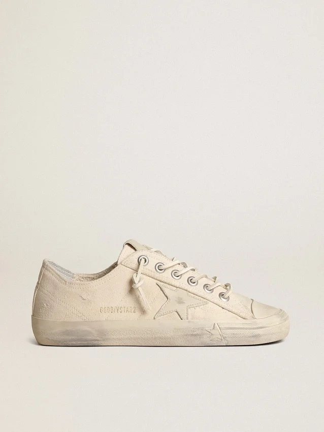 V-Star en lona color crema claro con estrella de piel blanco leche