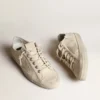 V-Star en lona color crema claro con estrella de piel blanco leche