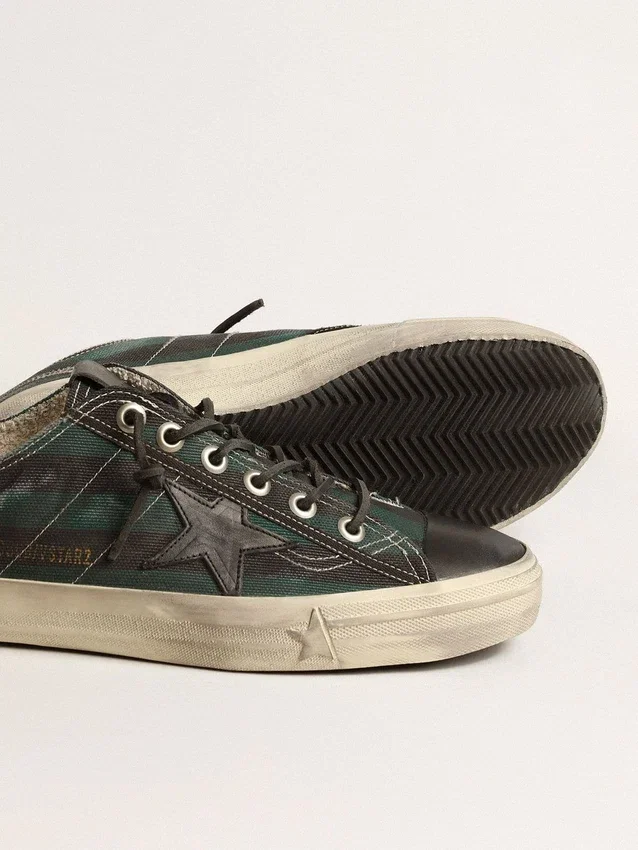 V-Star para hombre en lona a rayas negras y verdes con estrella y puntera de piel negra