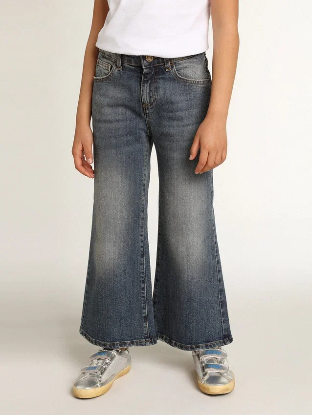 Vaqueros de corte ancho en denim azul medio