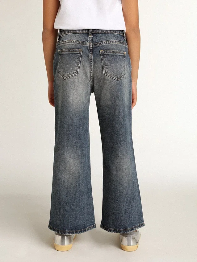 Vaqueros de corte ancho en denim azul medio