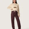 Vaqueros de mujer en denim burdeos con cristales degradados