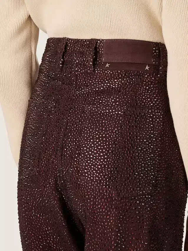 Vaqueros de mujer en denim burdeos con cristales degradados