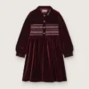 Vestido de niñas en color burdeos con efecto terciopelo y bordado en la parte delantera
