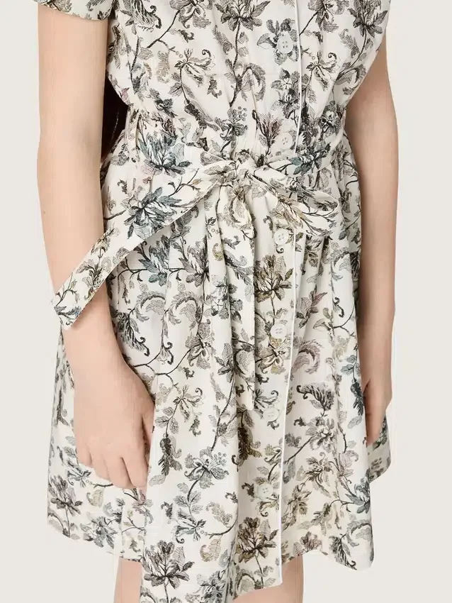 Vestido para niñas «Journey» de lona de algodón blanca con estampado floral verde