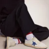 Zapatillas Ball Star para hombre en napa blanca con estrella y lengüeta del talón azules