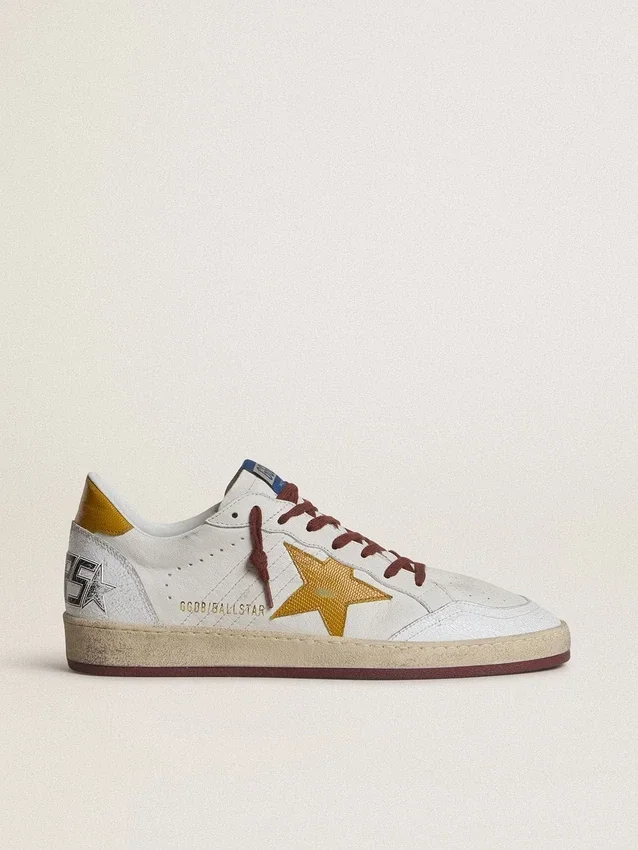 Zapatillas Ball Star para hombre en piel napa blanca con estrella y lengüeta en el talón de piel con estampado animal amarillo