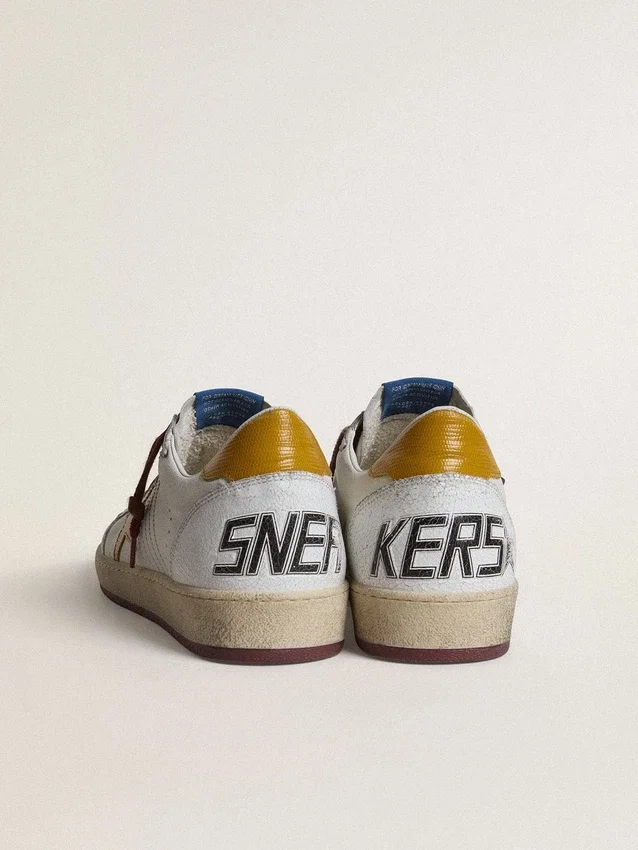 Zapatillas Ball Star para hombre en piel napa blanca con estrella y lengüeta en el talón de piel con estampado animal amarillo