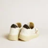 Zapatillas Ball Star para mujer en piel blanca con estrella dorada con purpurina y lengüeta del talón negra con purpurina
