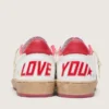 Zapatillas Ball Star Wishes para mujer en piel blanca con una estrella roja y lengüeta en el talón