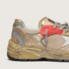 Zapatillas Dad-Star para hombre en piel laminada dorada y malla, con estrella de piel blanca y lengüeta trasera de piel dorada