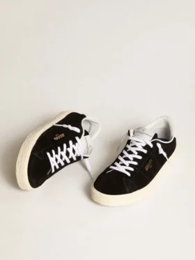Zapatillas de tenis para mujer en ante negro con lengüeta trasera de piel blanca
