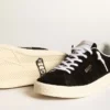 Zapatillas de tenis para mujer en ante negro con lengüeta trasera de piel blanca