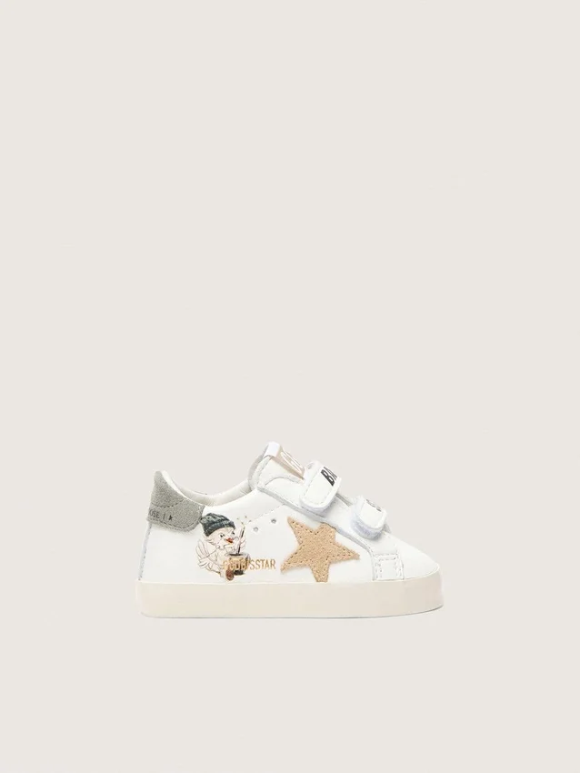 Zapatillas escolares para bebé en napa con estrella de ante beige y estampado de mascota