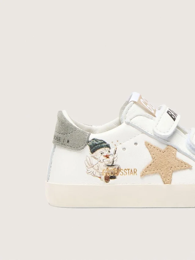 Zapatillas escolares para bebé en napa con estrella de ante beige y estampado de mascota