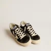 Zapatillas Hi Star para mujer en piel negra con lengüeta del talón con purpurina plateada