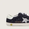Zapatillas «Junior Old School» de ante azul con estrella plateada brillante y lengüeta de cuero blanco en el talón