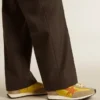 Zapatillas Marathon para hombre con parte superior de nailon amarillo y estrella naranja