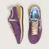 Zapatillas Marathon para mujer con parte superior de nailon morado y estrella blanca