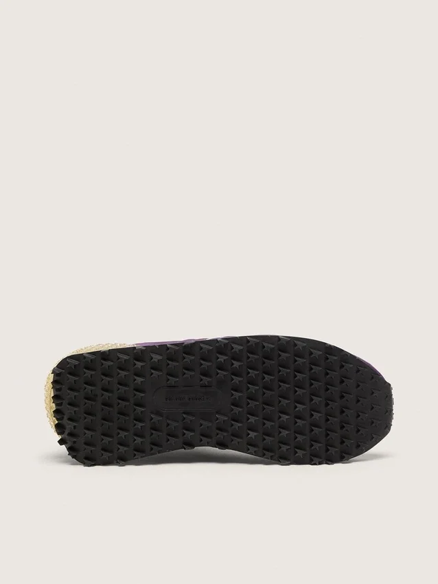 Zapatillas Marathon para mujer con parte superior de nailon morado y estrella blanca